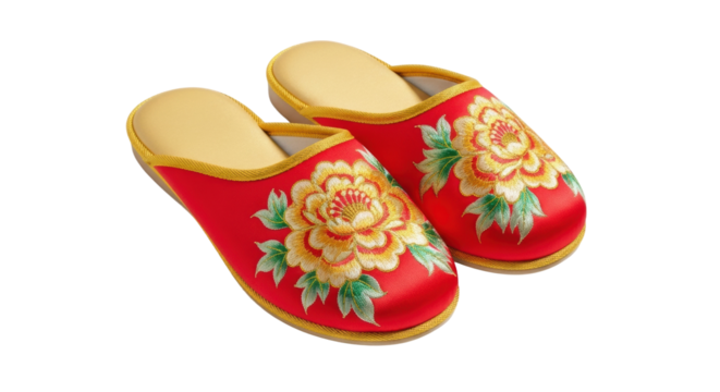 A pair of traditional red satin slippers with beautiful golden floral embroidery and yellow insoles, showcasing elegant and ornate cultural footwear from a high angle view - Powered by Adobe