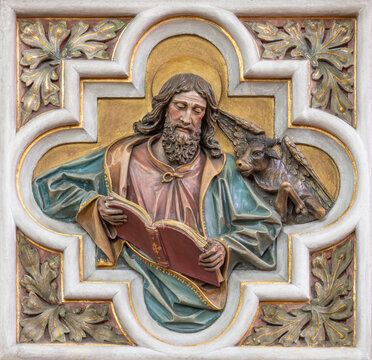 Vienna - The relief of St. Luke the Evangelist in church St. Severin by unknown artist from end of 19. cent.