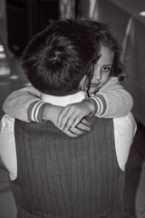 Father Embracing Child at Family Event &ndash; Tender Emotional Moment