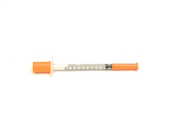 Diabetes special syringe with cup isolated on white