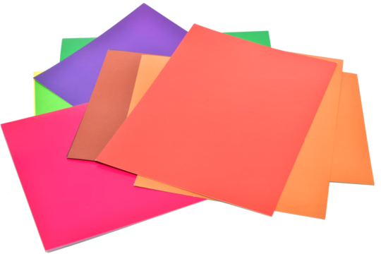 Sheets of multi-colored cardboard lie on a PNG background.