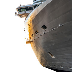 Naklejka premium Close Up of a Grand Luxury Cruise Ship Bow Illuminated by Golden Hour Sunlight Against a Stark Black Background Detailed View of Ship Hull Windows and Bridge Structure