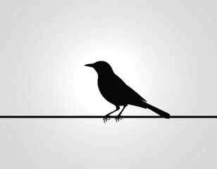 Fototapeta premium Silhouette of a bird perched on a wire against a light background.