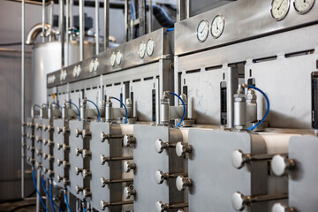 A large hydrocyclone battery at a potato starch factory. This modern stainless steel equipment is used for the multi-stage washing, refining, and concentration of starch milk