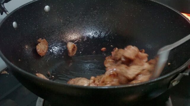 Deep Frying Thai Sausage (Kun Chiang) in Hot Oil