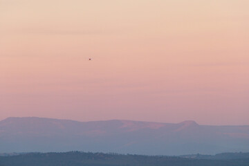 Minimalistic sunset photo of mountainous horizon