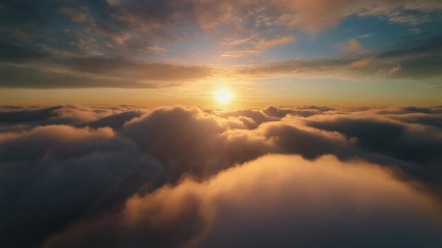 Breathtaking aerial photograph capturing a golden sunrise breaking through layers of clouds from above. The dramatic sky features warm golden and orange tones contrasting with cool blue clouds, creati