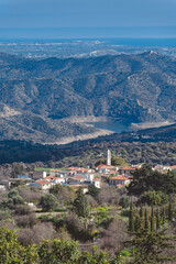 Kato Lefkara village overlooking mountains and artificial lake in Cyprus