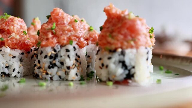 Spicy tuna sushi rolls on a plate