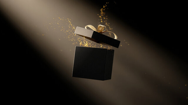A black gift box with a gold ribbon and confetti floating in a spotlight on a dark background