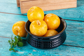 Raw ripe sweet yellow plums