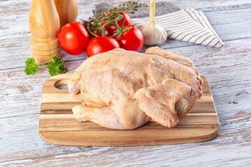 Raw whole uncooked organic chicken