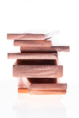 A set of copper busbars used in power installations, on a white background