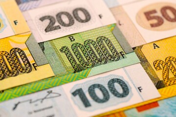 Congolese franc money bills in big amount on table close up. Rich life concept in Democratic Republic of Congo. Business and economy