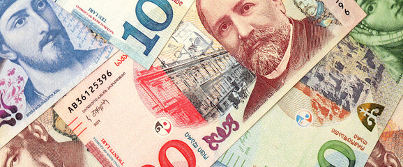 Georgian Lari currency money bills in bunch. GEL currency banknotes with different denomination close up