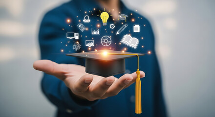 Hand Holds Graduation Cap Floating with Education Icons Idea Bulb Book Computer Pencil Graph User and Graduation Hat