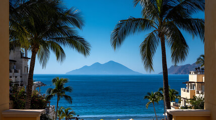 Palm trees frame ocean view with distant island and resort buildings blue sky