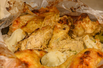 Close-Up of Oven-Bag Chicken with Broccoli and Cauliflower