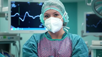 A portrait of a confident female surgeon in green scrubs and a mask, standing in an operating room with a heart monitor in the background. - Powered by Adobe