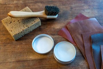 Sponge, brush, leather balm and leather patches.Leather shoe care products.Mink wax.