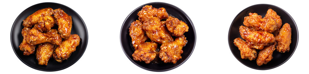 top view of fried chicken. Crispy fried chicken wings covered in sauce isolated.