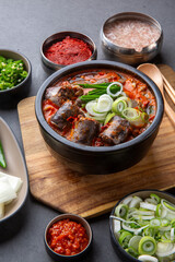 Korean traditional food, sundaeguk and side dishes 한국의 전통음식인 순대국과 반찬들