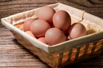 Basket of fresh brown eggs
