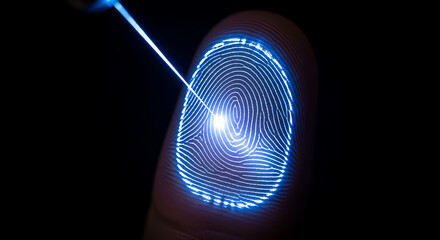 Digital fingerprint scan with blue light beam for security concept