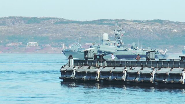 The annual celebration of the Day of the Russian Navy. Warships in the waters of the Kola Bay.