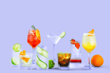 Alcoholic cocktails against a lilac background. 
