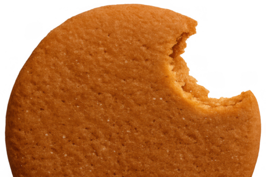 Cookie with a bite taken out, showing delicious texture and crisp edge on transparent background