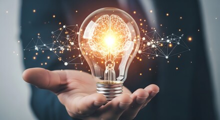 Illuminated Light Bulb with Brain Inside Symbolizing Innovation and Ideas.