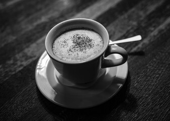 cup of coffee  on a wooden table