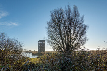 Roerdump observation tower in Oostvaardersplassen national park on a winter morning, Netherlands