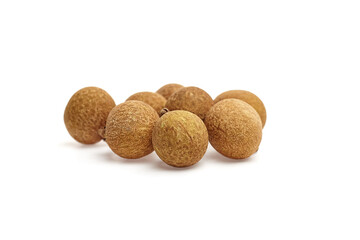 Longan tropical fruit, round and brown, arranged artistically on a clean surface, showcasing its textured skin and natural beauty, ideal for culinary and health concepts