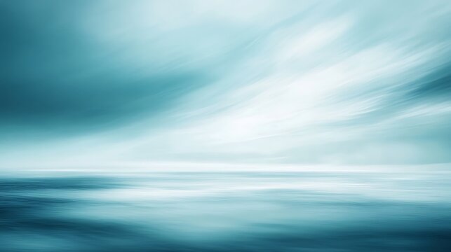 Abstract ethereal light rays shining through cloudy sky over ocean