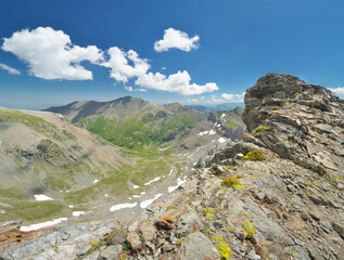 Mountains peaks and hills at summer day.