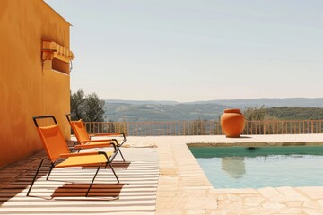 Naklejka premium Terraza con piscina y tumbonas frente a paisaje mediterráneo, Piscina exterior con vistas panorámicas y decoración mediterránea, Patio mediterráneo con piscina y paisaje natural de fondo