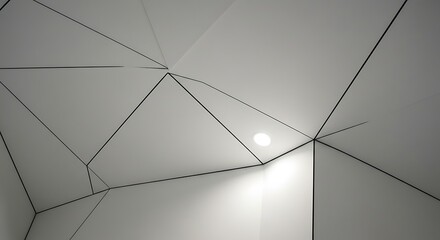 Geometric ceiling design with a network of interconnected triangular shapes and a central light source.