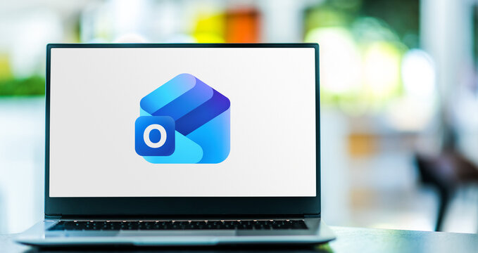 Laptop computer displaying logo of Microsoft Outlook