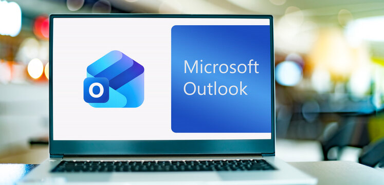 Laptop computer displaying logo of Microsoft Outlook