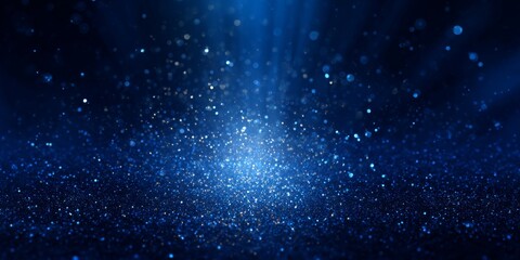 Naklejka premium A Stunning Display of Glowing Blue Particles Illuminating a Dark Background, Creating a Magical Atmosphere of Wonder and Beauty