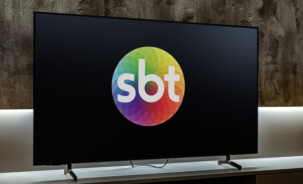 Flat-screen TV set displaying logo of SBT