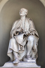 the statue of filippo brunelleschi outside the palazzo dei canonici in the piazza del duomo in florence tuscany italy