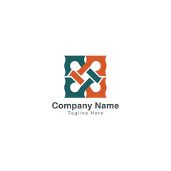 Obraz premium A modern geometric logo featuring interlocking shapes in teal and orange, symbolizing unity, structure, and professional brand identity.
