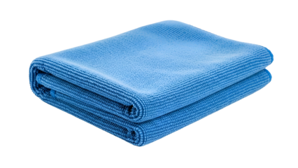 Folded blue microfiber cloth, neatly stacked, isolated on black, showing textured surface