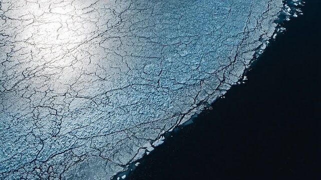 Aerial view of cracked ice surface