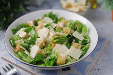 A bowl with classic Caesar salad