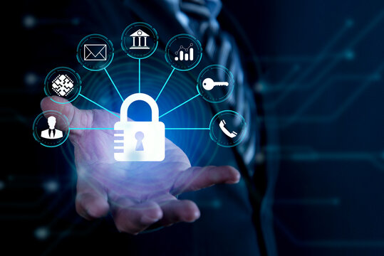 Businessman holding padlock and internet security icons in hand on global networking connection, Data protection and network security,