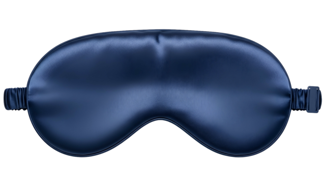 A close-up studio shot of a smooth, dark blue silk sleep mask on a black background